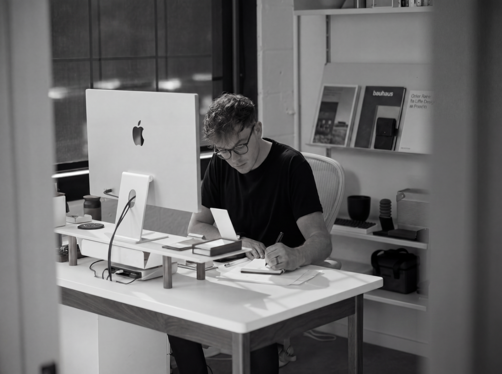 Sam working at a desk